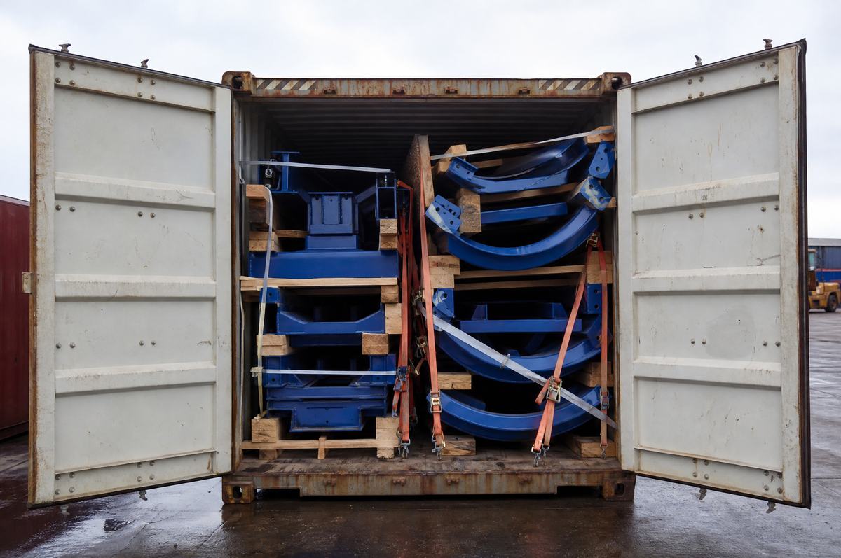 Importing an Amusement Ride from China: Documents, Shipping and Site Handover — Track sections secured with dunnage inside a container — the
